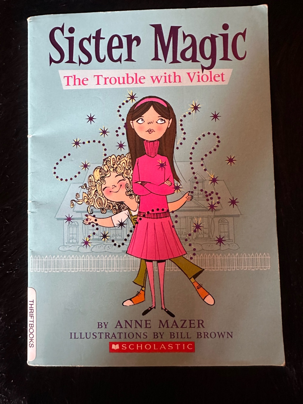 Scholastic Sister Magic Series The trouble with violet by Anne Mazer.